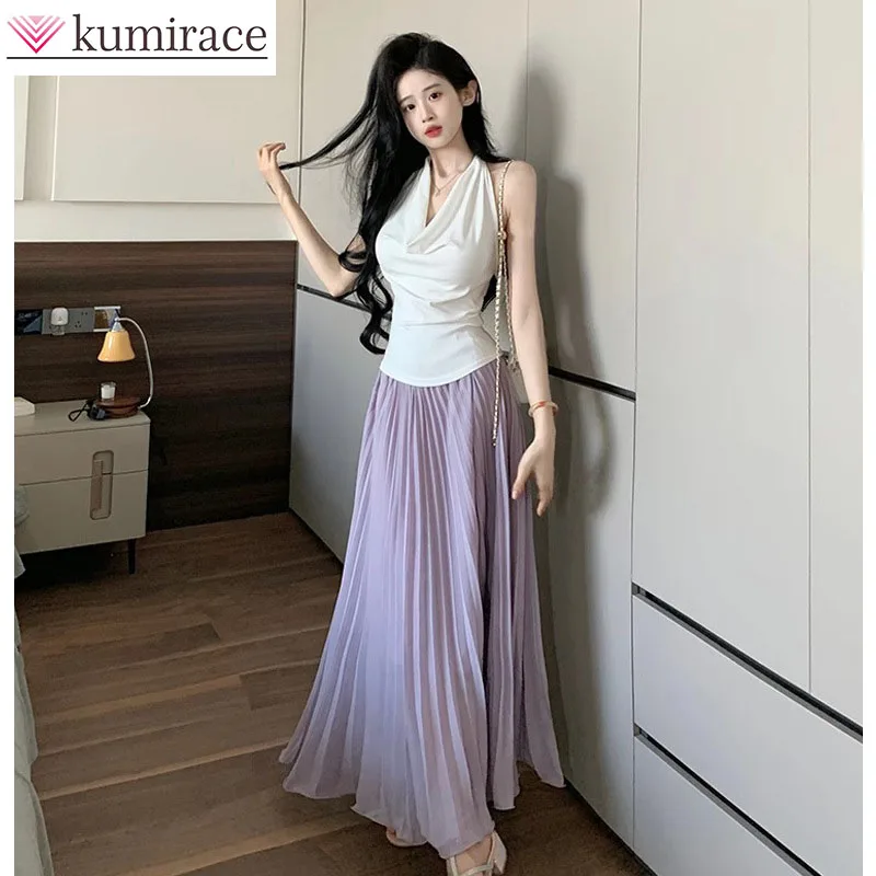 

Модный женский летний комплект во французском стиле: топ без рукавов с волнистым вырезом и юбка с высокой талией, нежный и роскошный.