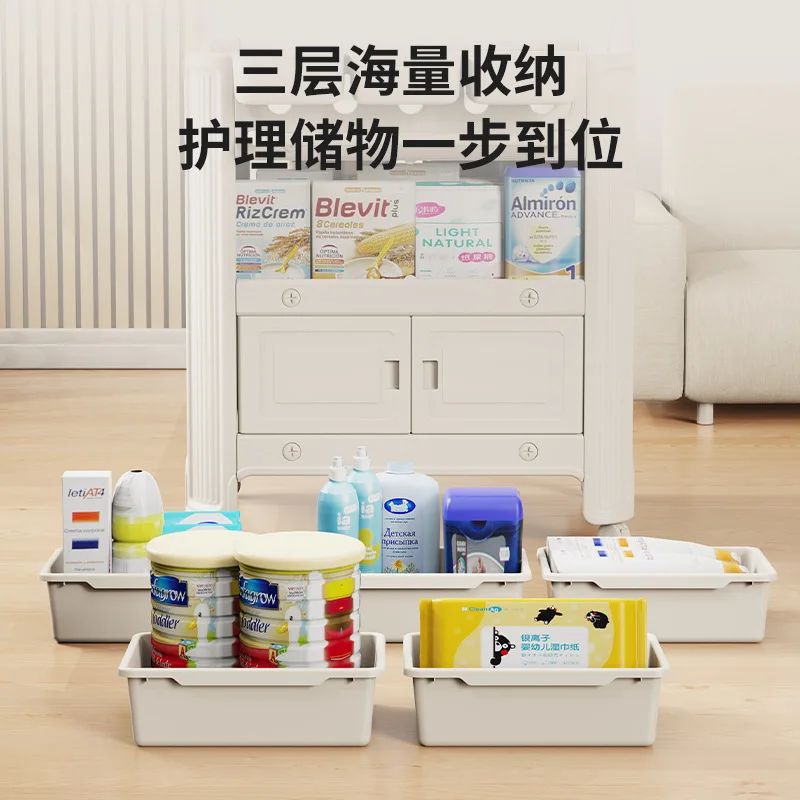 طاولة الحفاضات طاولة العناية بالطفل طاولة تغيير الطفل حديث الولادة لمسة التدليك