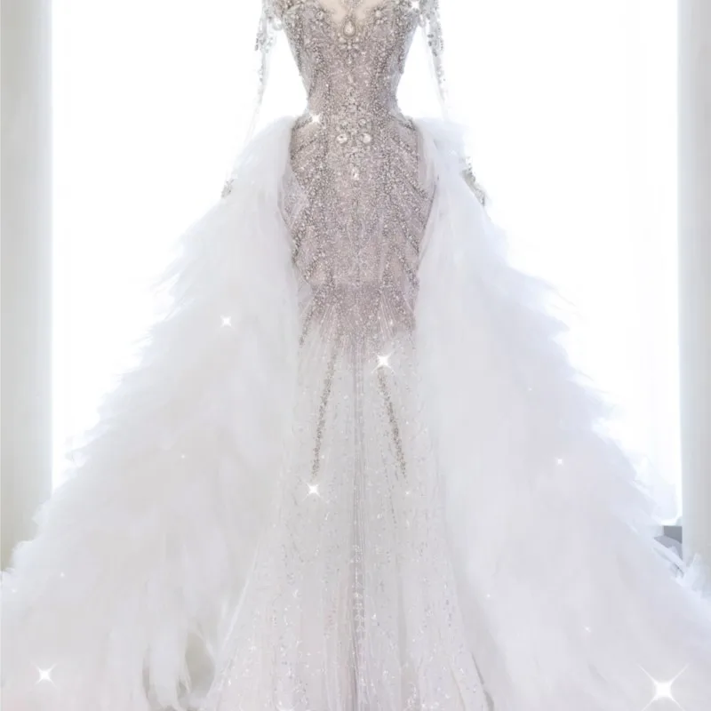 A new fish-tail light luxury dress with one-shoulder trailing tail for welcoming guests and getting marriage certificate