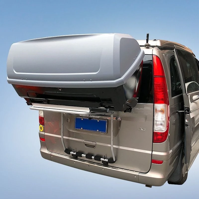 

trunk hanging from the back of the car, rear frame of the RV, backpack, clothing storage box.