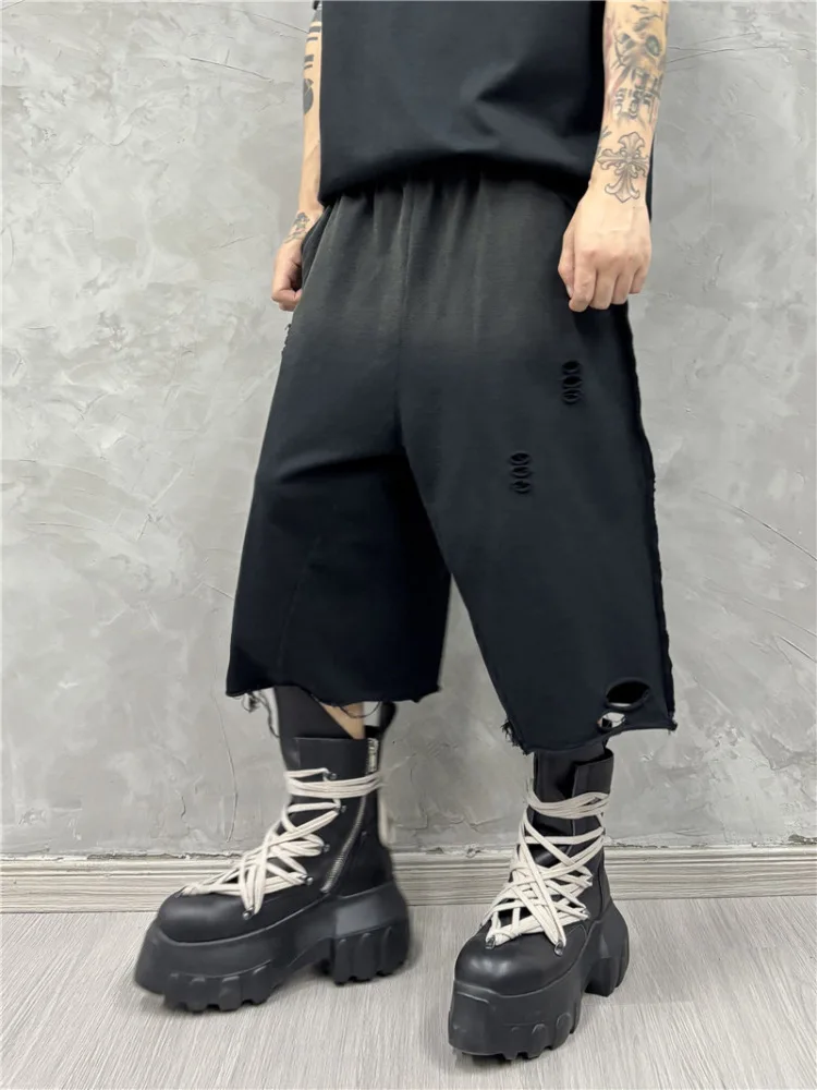 Zware donkere retro gewassen gradiënt gescheurde vrije tijd middenbroek mode trendy losse cropped shorts heren