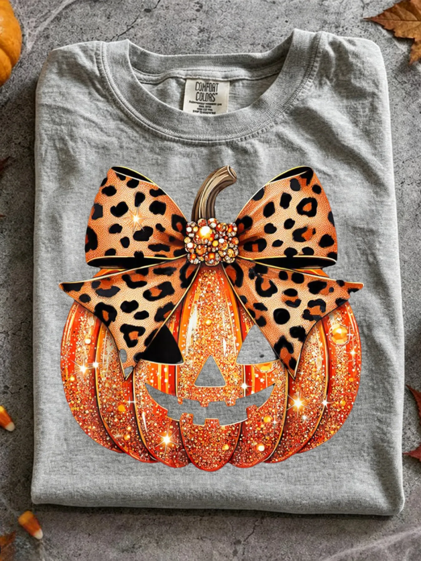 [Multicolored T-Shirt] Glitter for halloween Jack-O'-Lantern Pumpkin T-Shirt with Leopard Print Bow - Trendy Sparkly Short Sleeve Crew Neck Tee Super Soft Breathable Casual Fit Top - Ideal for Halloween Parties