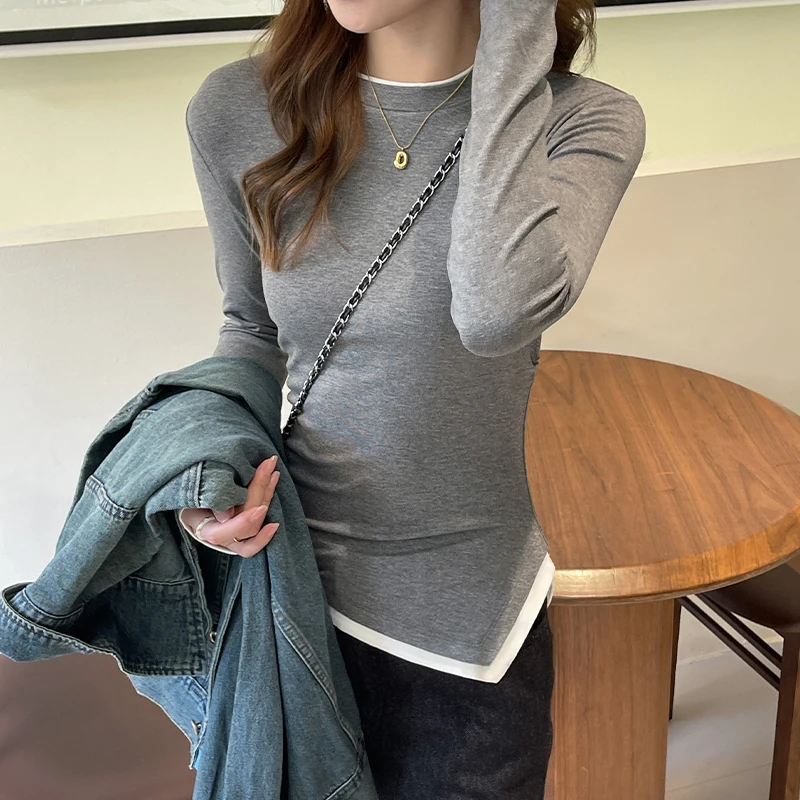 Korean Retro Round Neck Irregular Hem Collision Fake Two Pieces Long Sleeve Bottom Shirt Women's Niche Pleated Splicing Tops