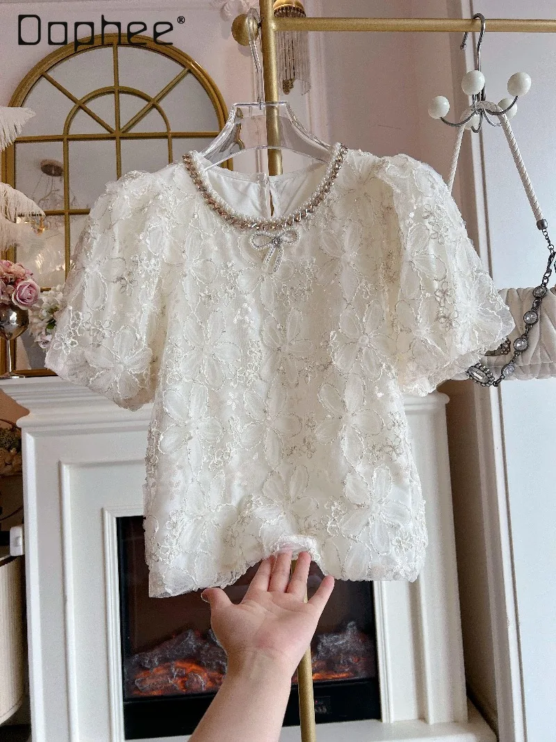 

Spring Korea Ins Heavy Industry Diamond Bubble Sleeve Lace Shirt Top Temperament Light Luxury Embroidery Loose Skinny Top Women