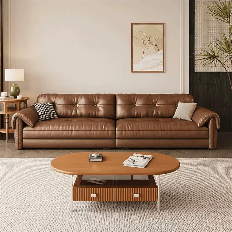 Modern brown leather L-sofa with recliner for the living room.