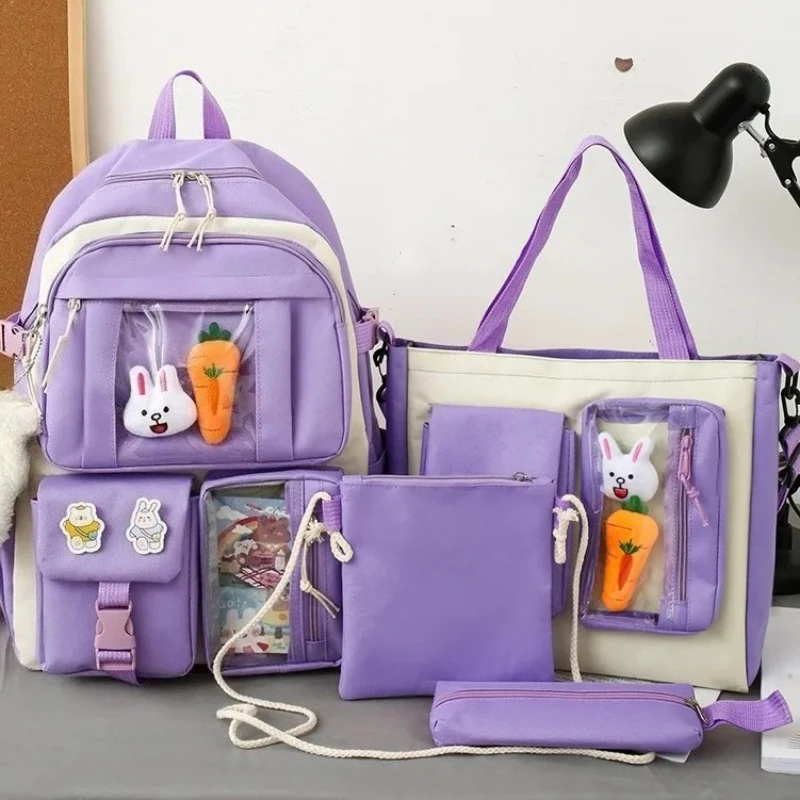 مجموعة مكونة من 4 قطع من حقائب الظهر ذات سعة كبيرة لطلاب المدارس الابتدائية خفيفة الوزن وحقائب مدرسية للفتيات في المدارس الابتدائية