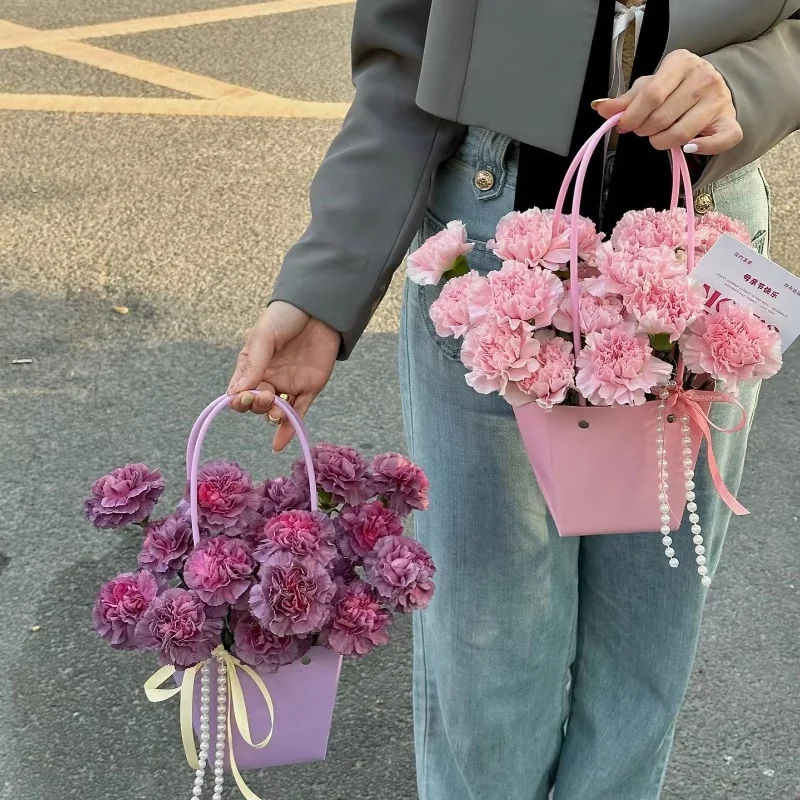 Custom UV Logo Colored Waterproof Kraft Paper Handbag Handheld Gift Snack Bouquet Handbags Festival Flower Packaging Handbag