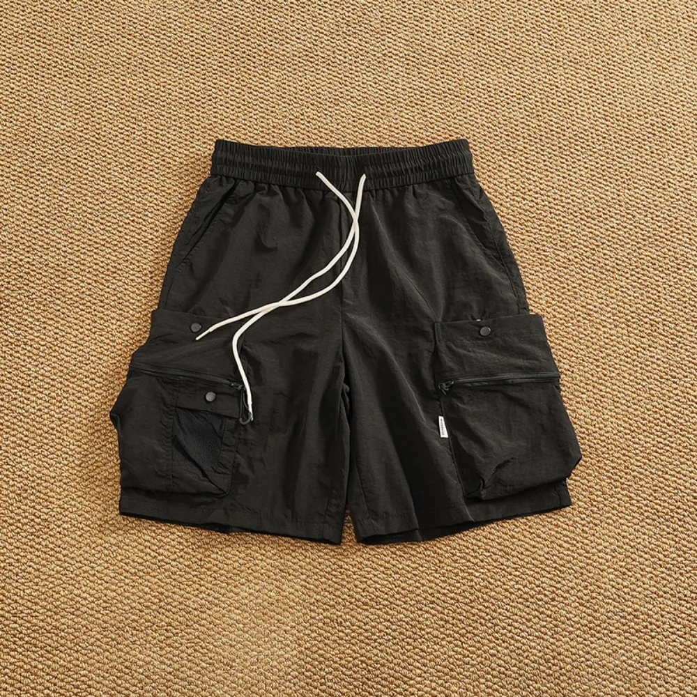 شورت سريع الجفاف للرجال بنمط جديد شورت عمل عصري وفضفاض للرجال صيفي متعدد الاستخدامات سروال خمس نقاط غير رسمي