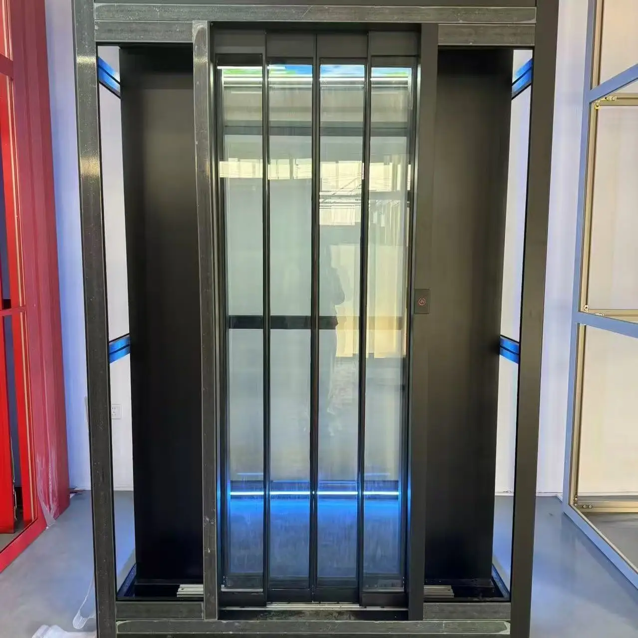 Electric Double Sliding Doors With Modern Design And Metal Construction For The Entrance Of A Residential Villa