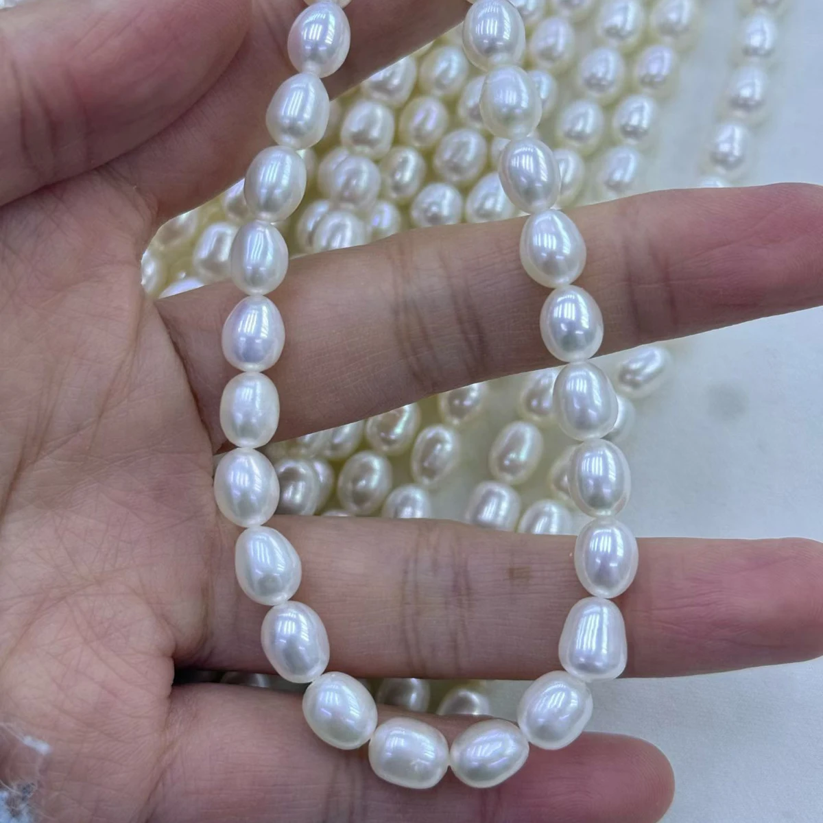

6.5–7.5mm Factory Wholesale Rice-Shaped Pearls 100% Natural Freshwater Pearl Semi-Finished Bead for Jewelry Making DIY Necklaces