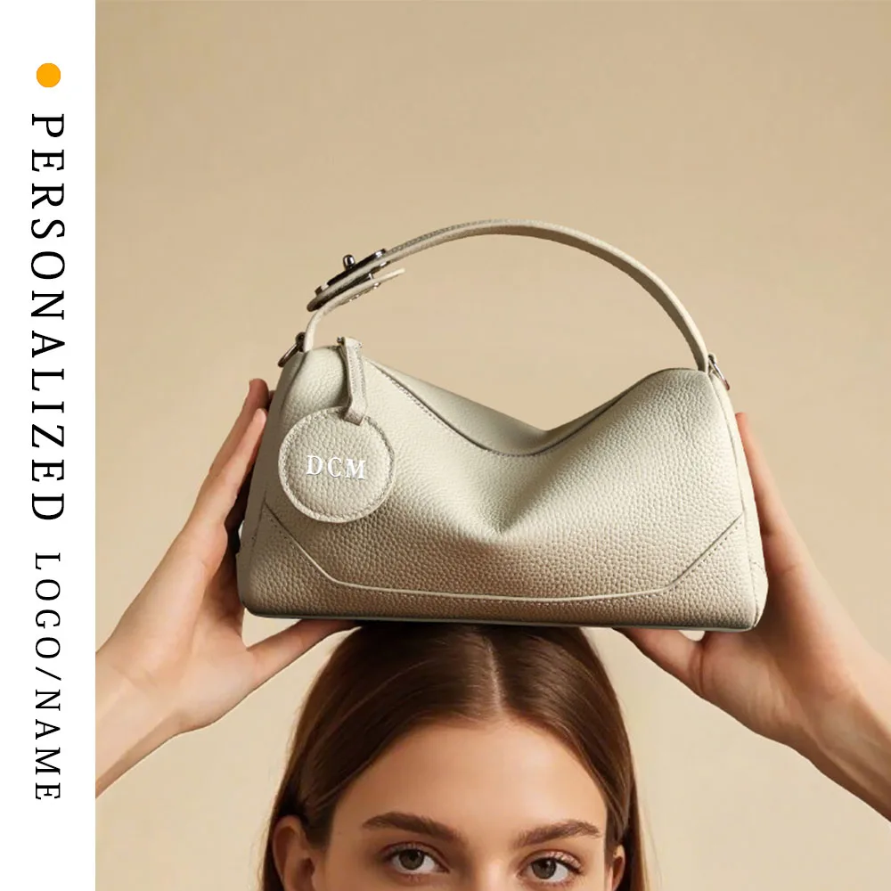 

2025 Personalized Gold-pinned TOGO Top Layer Cowhide Women's Bag Fashionable Pillow Bag Versatile Trendy Handheld Crossbody Bag