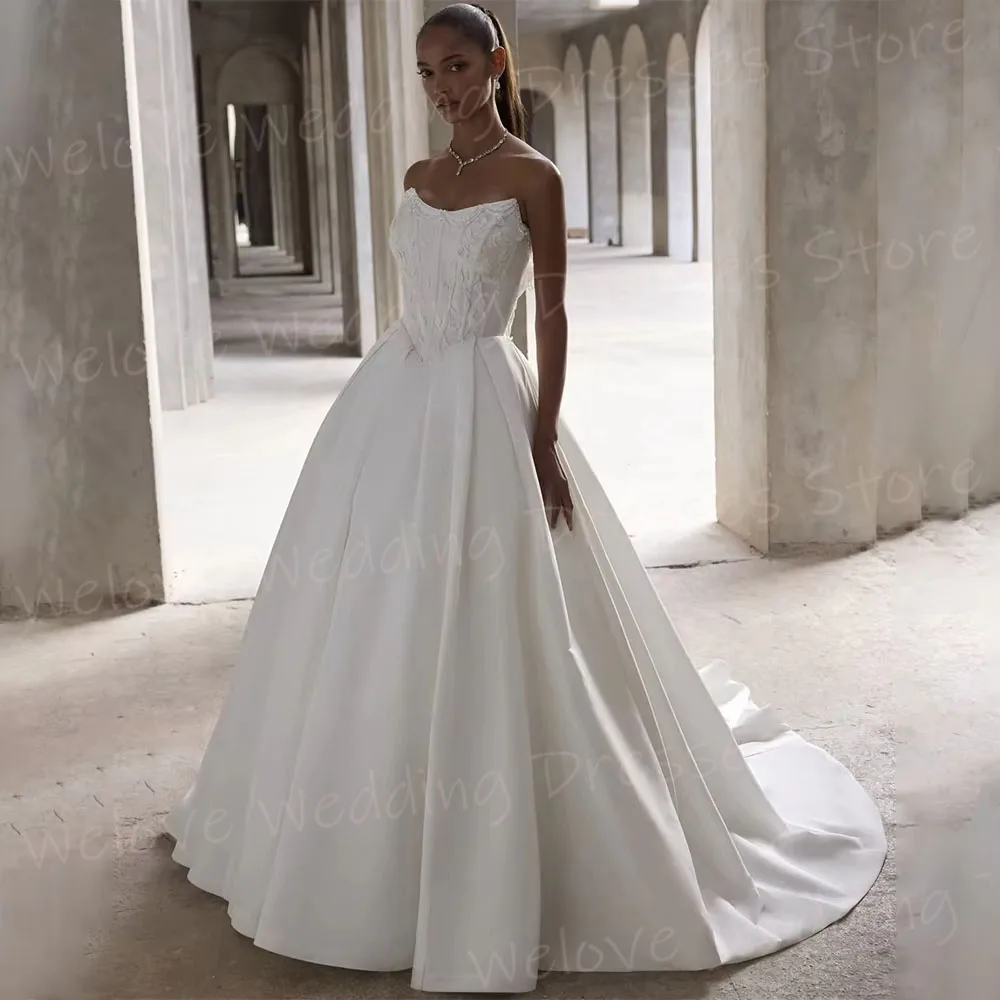 Charmante A-Linie Brautkleider für Damen, trägerlos, Applikationen, Robe De Mariée, individuelle Brautkleider, ärmellos, Vestido De Novia