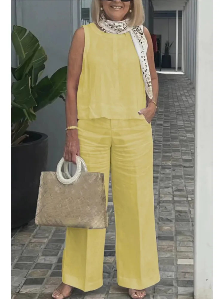 Abito da donna nuovo estivo Top senza maniche Pantaloni a gamba larga Set da due pezzi Moda Casual Solid Holiday Set da 2 pezzi Abbigliamento da donna