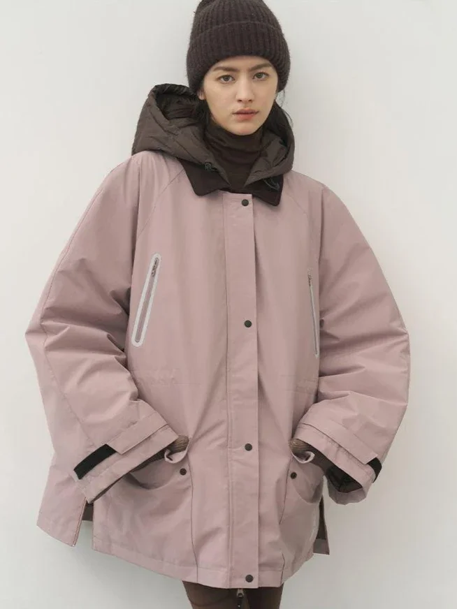 2025 Moda europea Invierno Nueva chaqueta de plumón para mujer Chaqueta de trabajo holgada con empalme a prueba de viento para ir al trabajo