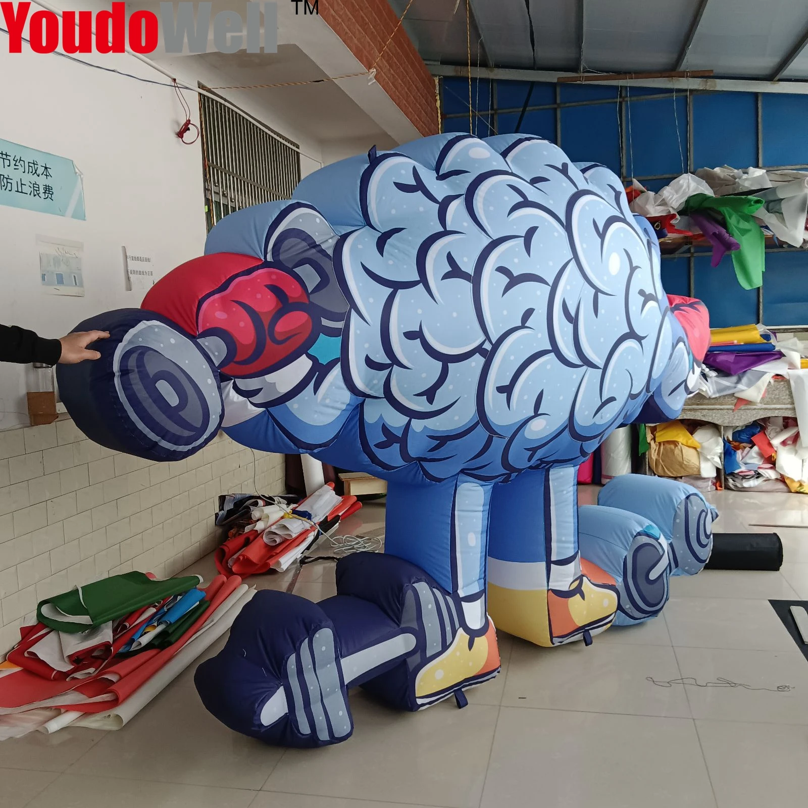 Cartoon of inflatable brain lifting dumbbells