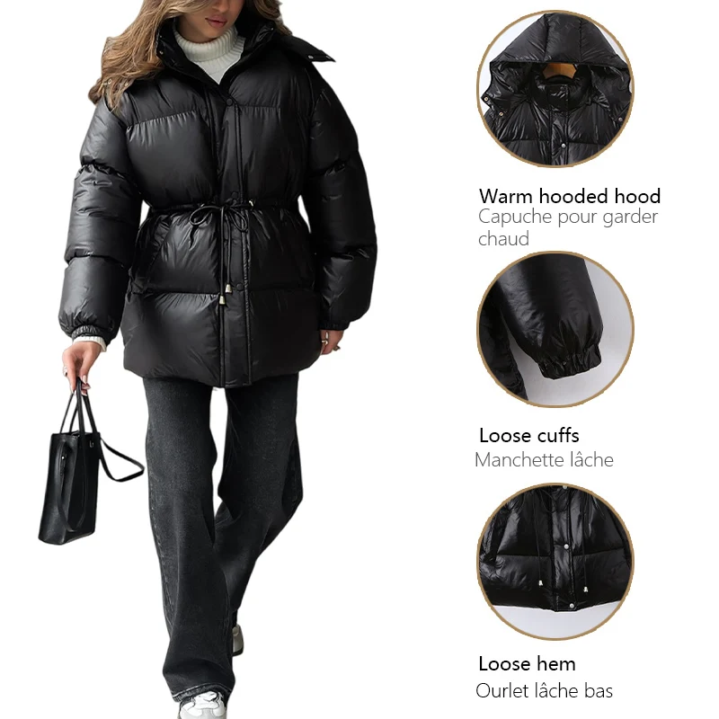 2025年冬新作レディース服、黒のミドル丈フード付きジップアップドローストリング付き暖かいコットンジャケット。