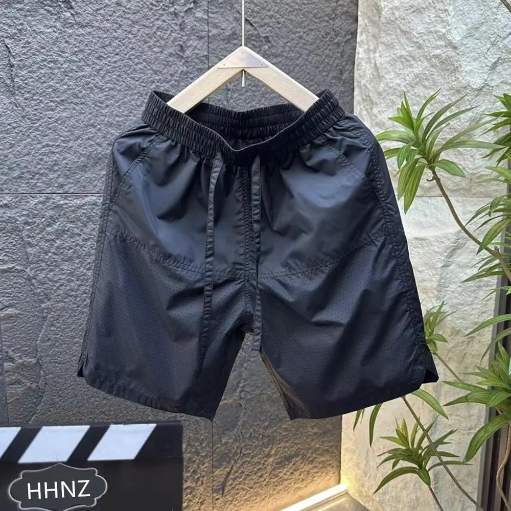 

Летние дышащие повседневные мужские брюки из ледяного шелка Qui Dry High End Sports Five Beach Pants Loose Hollow out Design m...
