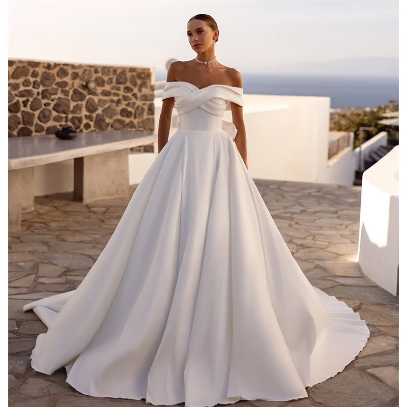 

Elegant Wedding Dress All Satin Princess Ball Gown Sleeveless Boat Neck Customized Bride Dress Bow Button Robe MariéE Satin