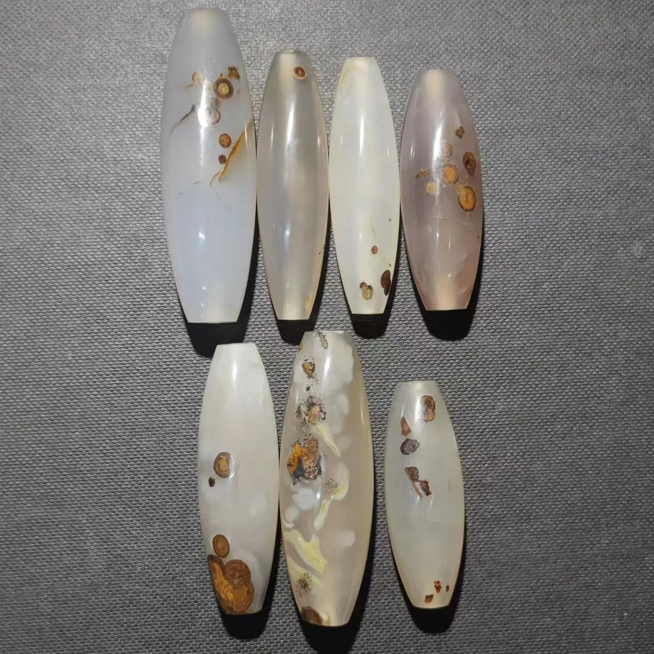 

7pcs/lot natural rare precious white material meng dzi Strong Power Stone Nine-eyed stone shale Collectible semitransparent diy