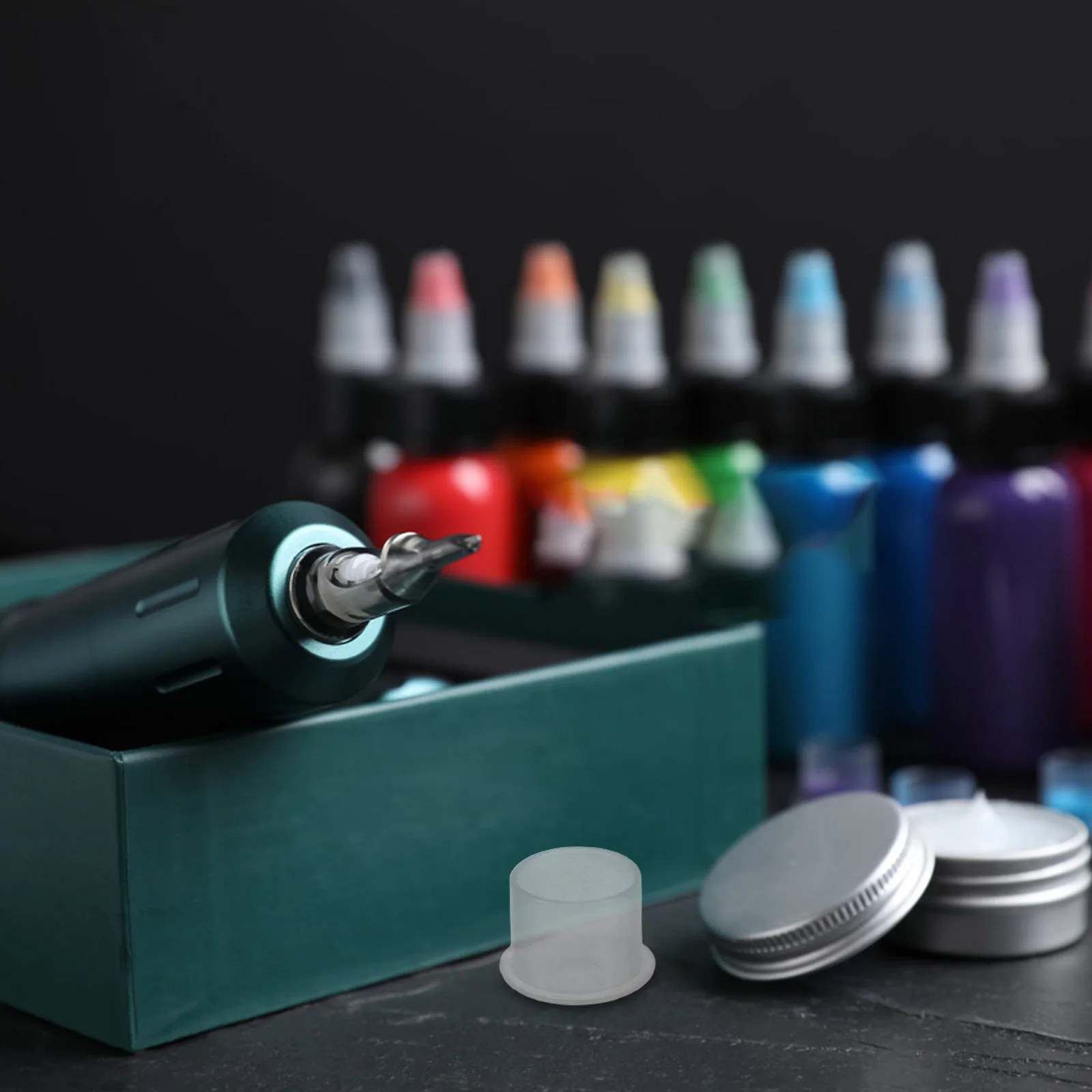 

600pcs Tattoo Ink Caps Small Size Plastic Round Pigment Cups For Tattooing Efficient Storage Stable Bottom Portable Tattoo