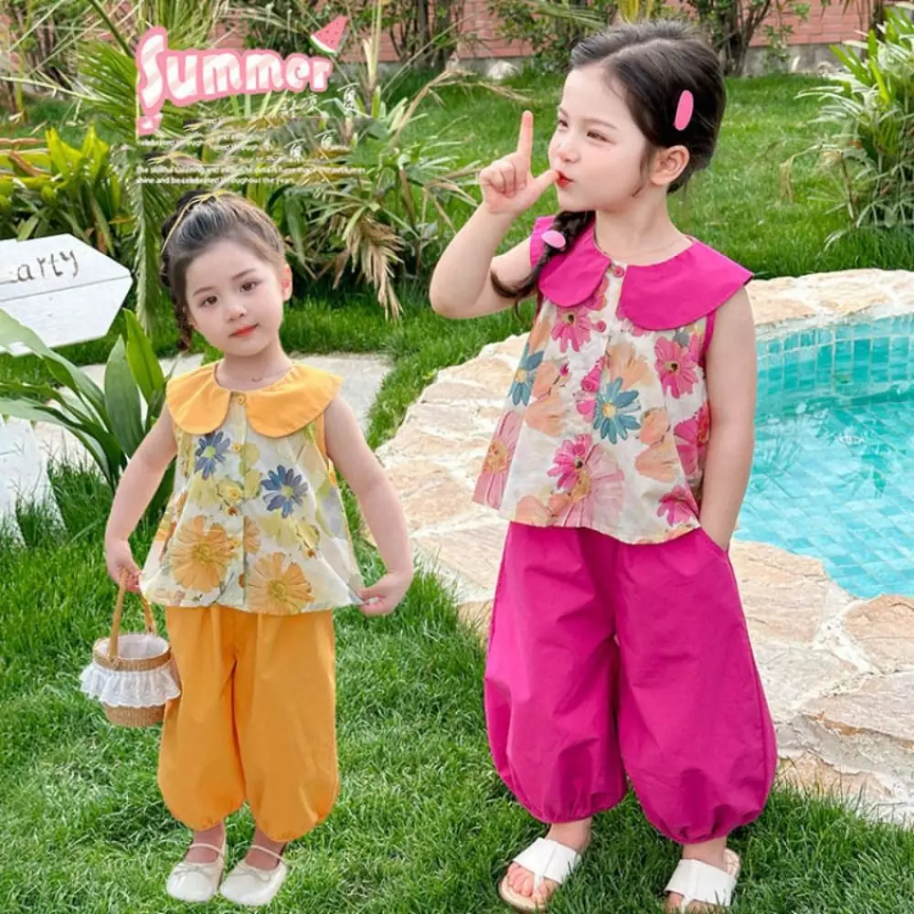 กางเกงขากว้างสาวชุดดอกไม้เสื้อยืดสองชิ้นชุดพิมพ์ลายดอกไม้แขนสั้นสบายพลิกคอเสื้อผ้าเด็กชุด
