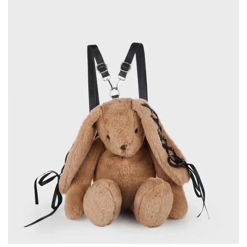 2024 Mochila de conejo de peluche con diseño de nicho popular Mochila de conejo de piel con correa de encaje linda y versátil Mochila de moda personalizada Bolso de lujo de moda Recomendación del centro comercial