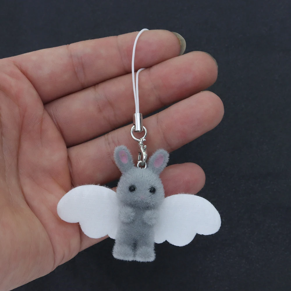 1 قطعة يتدفقون الراتنج سحر أرنب قلادة مع أجنحة لصنع المجوهرات حقيبة الهاتف المحمول اكسسوارات السيارات الديكور