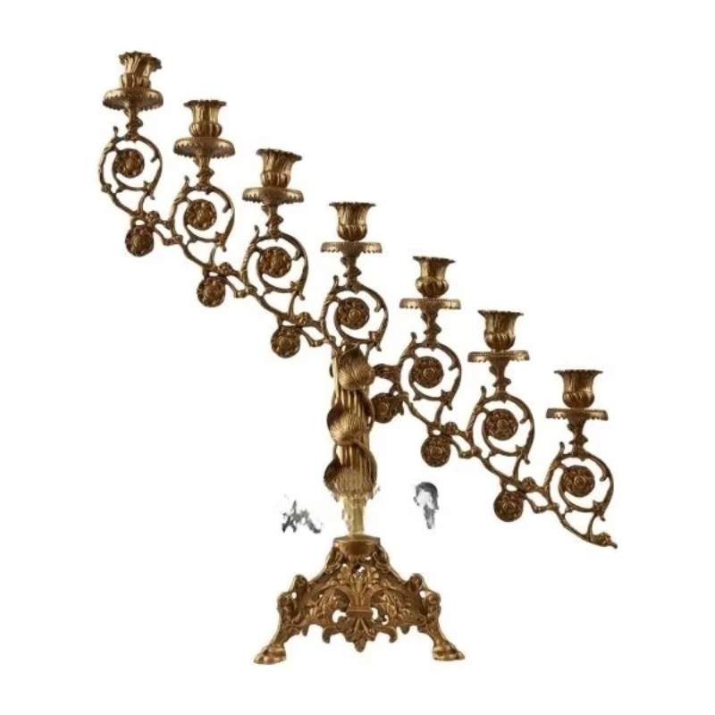 

Antique brass candlesticks with ornate art prints and multiple curved arms for elegant vintage home decor
