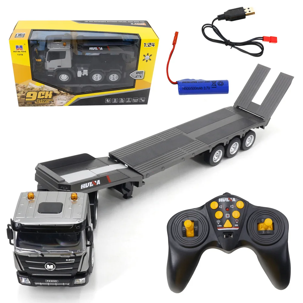 

HUINA 1:18 Scale Remote Control Flatbed Trailer Toy with Light And Sound Effects Nine-Channel Engineering Vehicle Simulation