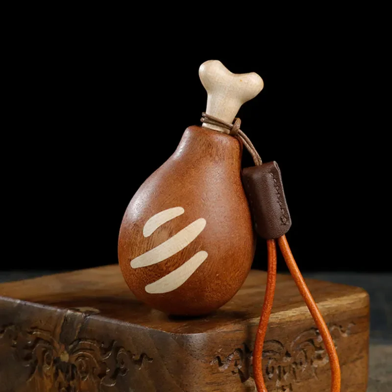 

Good luck, big chicken thighs, solid wood carvings, handlebars, bag pendants, birthday gifts for friends, keychain pendants.