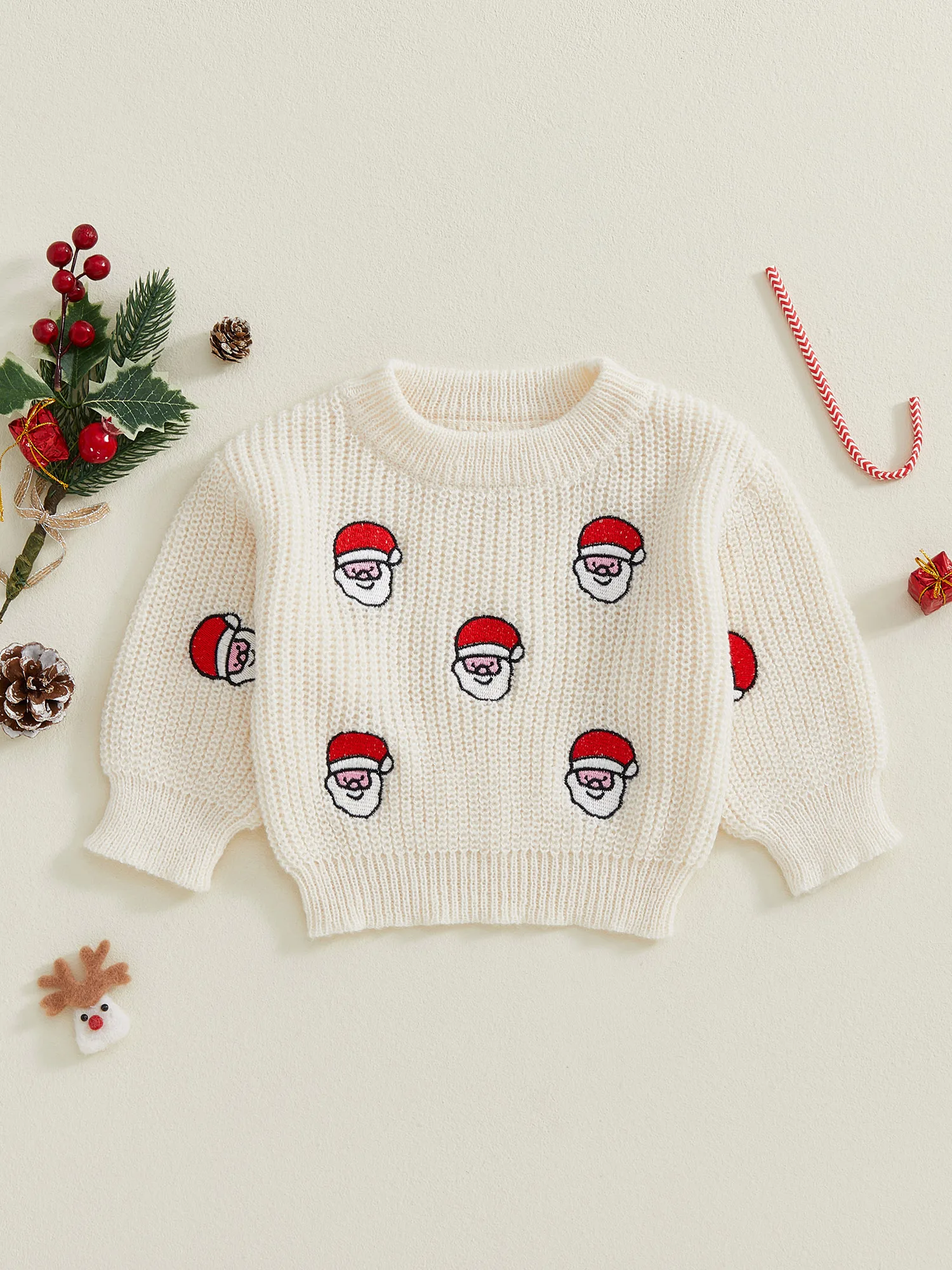 

Детский праздничный вязаный свитер с оленями, помпонами и ребристыми манжетами для тепло праздничного зимнего сезона