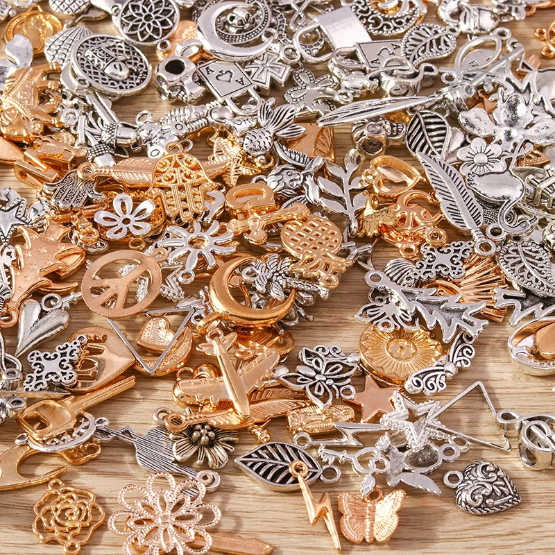 

Tusember Random Mix 100Pcs Fashion Moon Star Charms Alloy Animal Flower Cross Pendants of Bracelets Necklaces DIY Jewelry Making