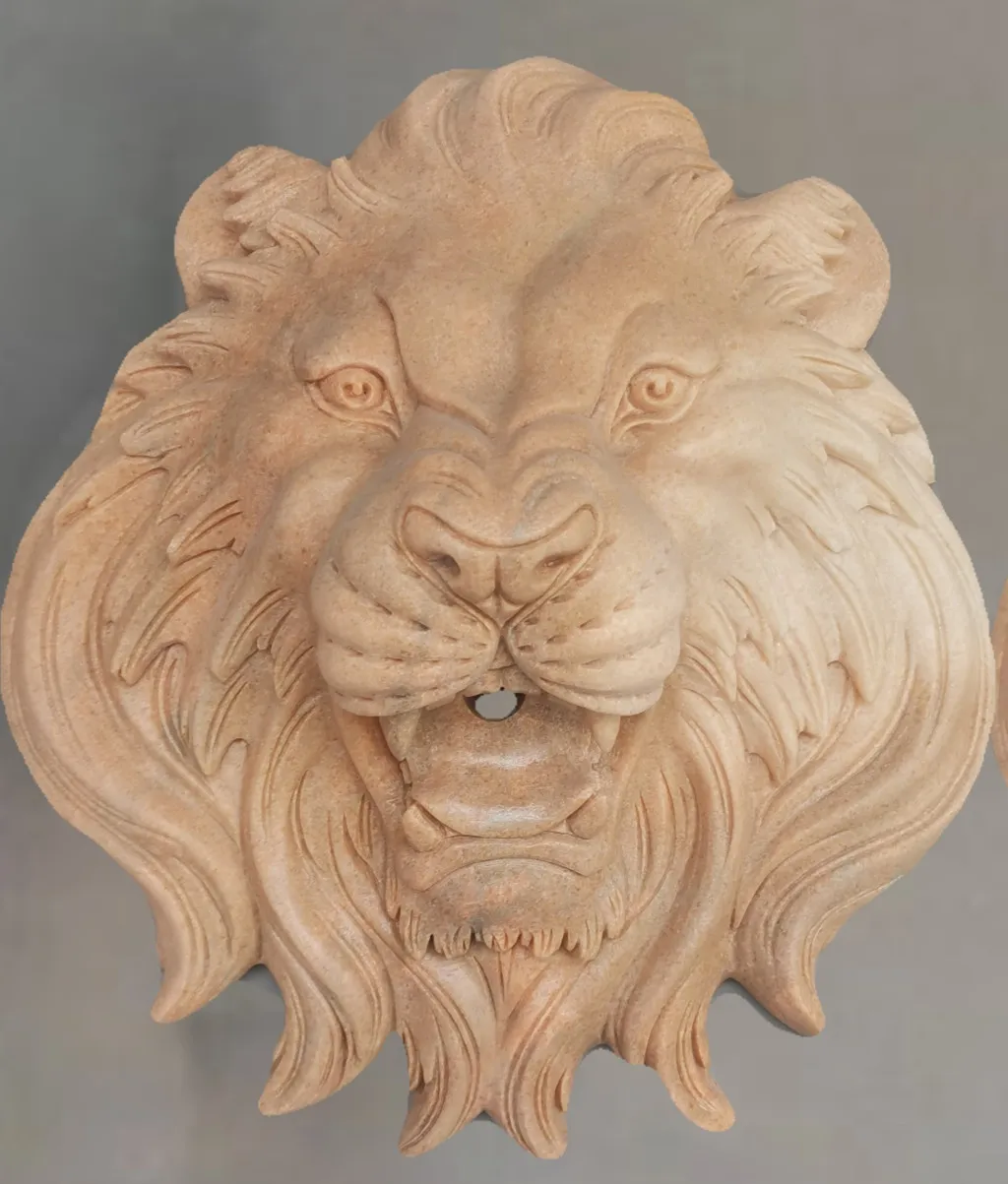 Stone carvings spraying water lion's heads, animal head animal sculptures, garden interior and exterior hanging ornaments