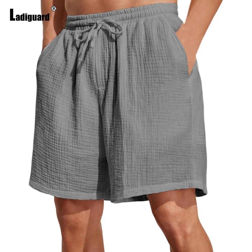

Мужские повседневные широкие шорты размера плюс 5xl, однотонные серые, белые полубрюки на шнурке, новинка лета 2025 года, свободные пляжные шорты