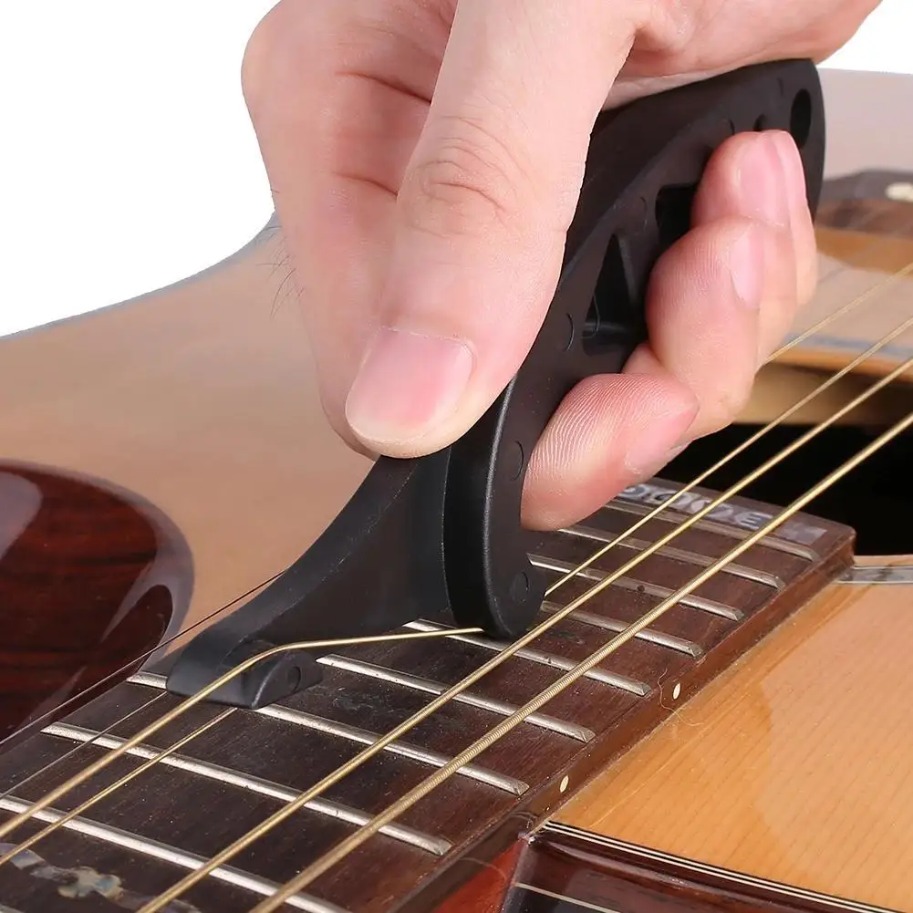 Herramienta de plástico para ensanchador de cuerdas de guitarra, suministros para instrumentos musicales, guitarra eléctrica acústica, violín, ukelele