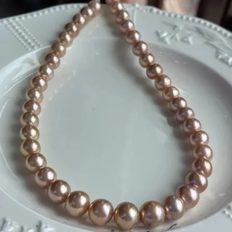 

Ожерелье из натурального коричневого жемчуга диаметром 9–10 мм, застежка из стерлингового серебра 925 пробы,