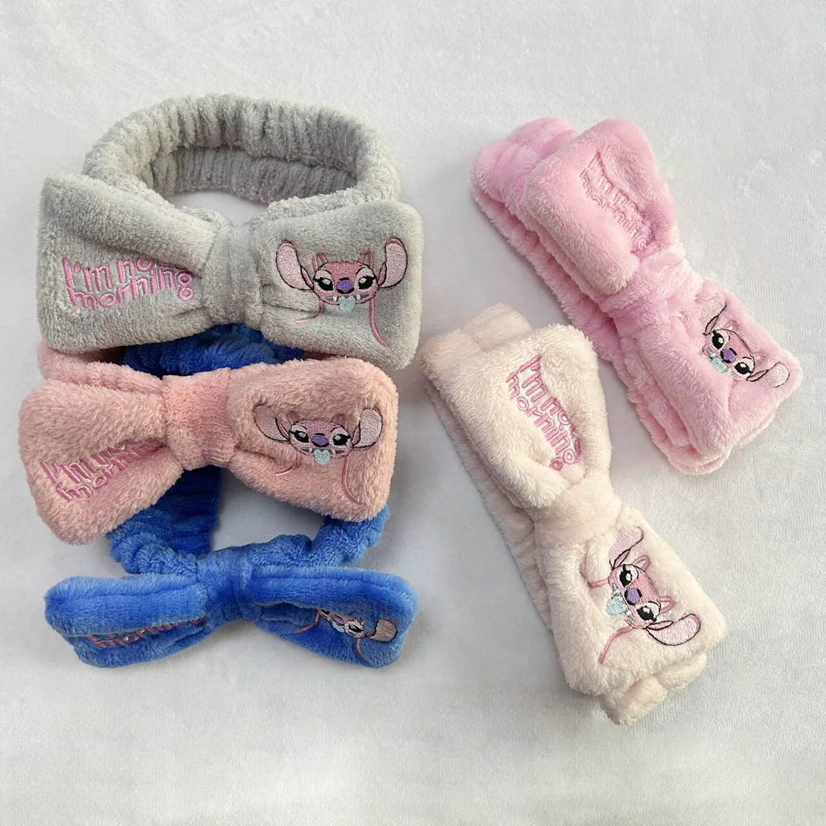 ディズニー漫画かわいい竹馬ヘアバンドぬいぐるみ竹馬洗顔リストバンドソフトメイク人形ヘアストラップ