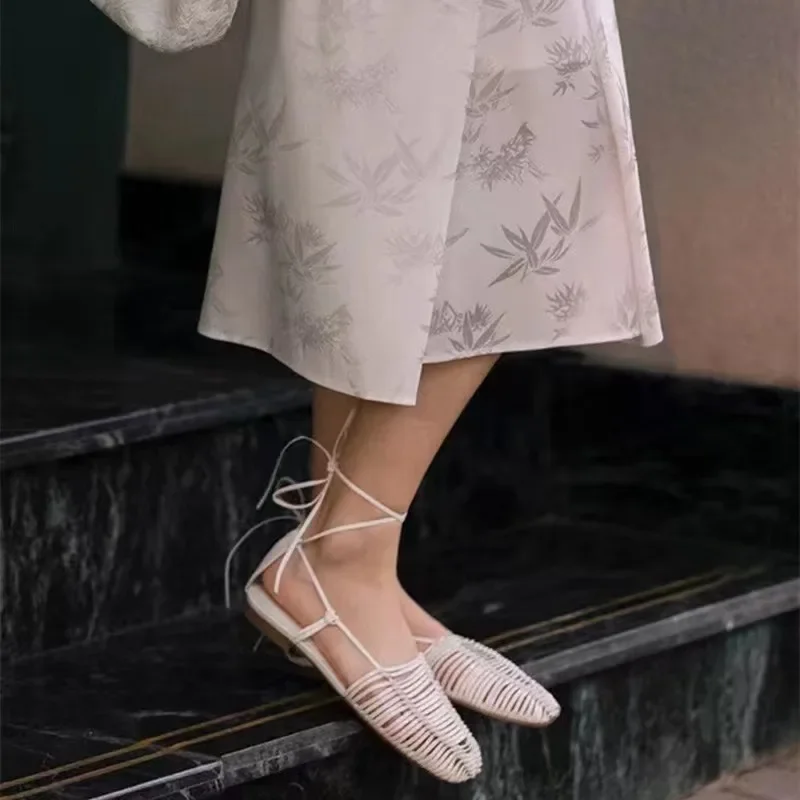 2024 Summer Handwoven Hollow Single Shoes Leather Roman Sandals Entangled Flat Shoes Women's Feet Loop Cross Strap Shoes