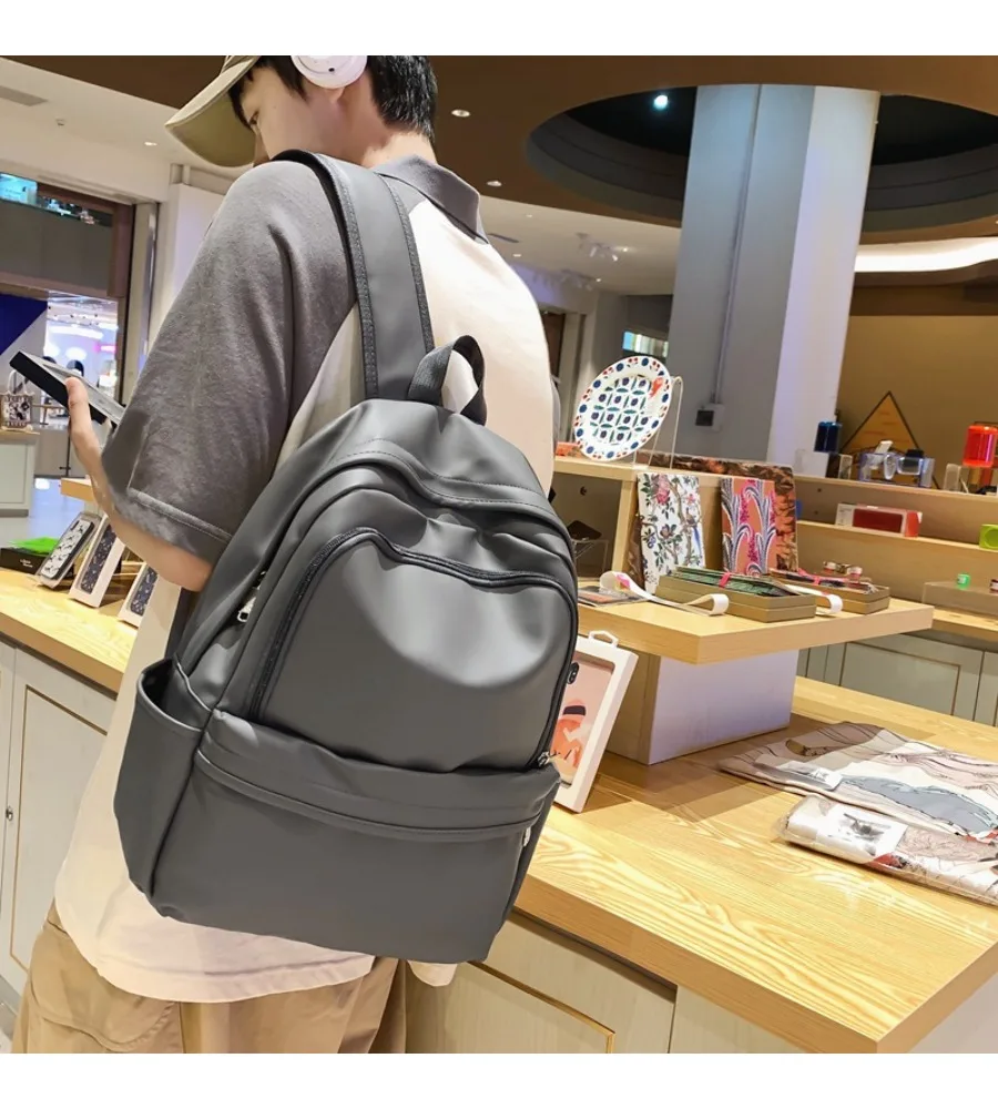 Soft PU backpack men's large capacity women's trend fashion junior high school student high school college student schoolbag