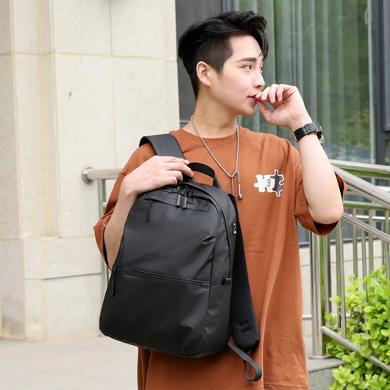Large capacity schoolbag junior high school business backpack men's high-end computer bag simple and lightweight new backpack