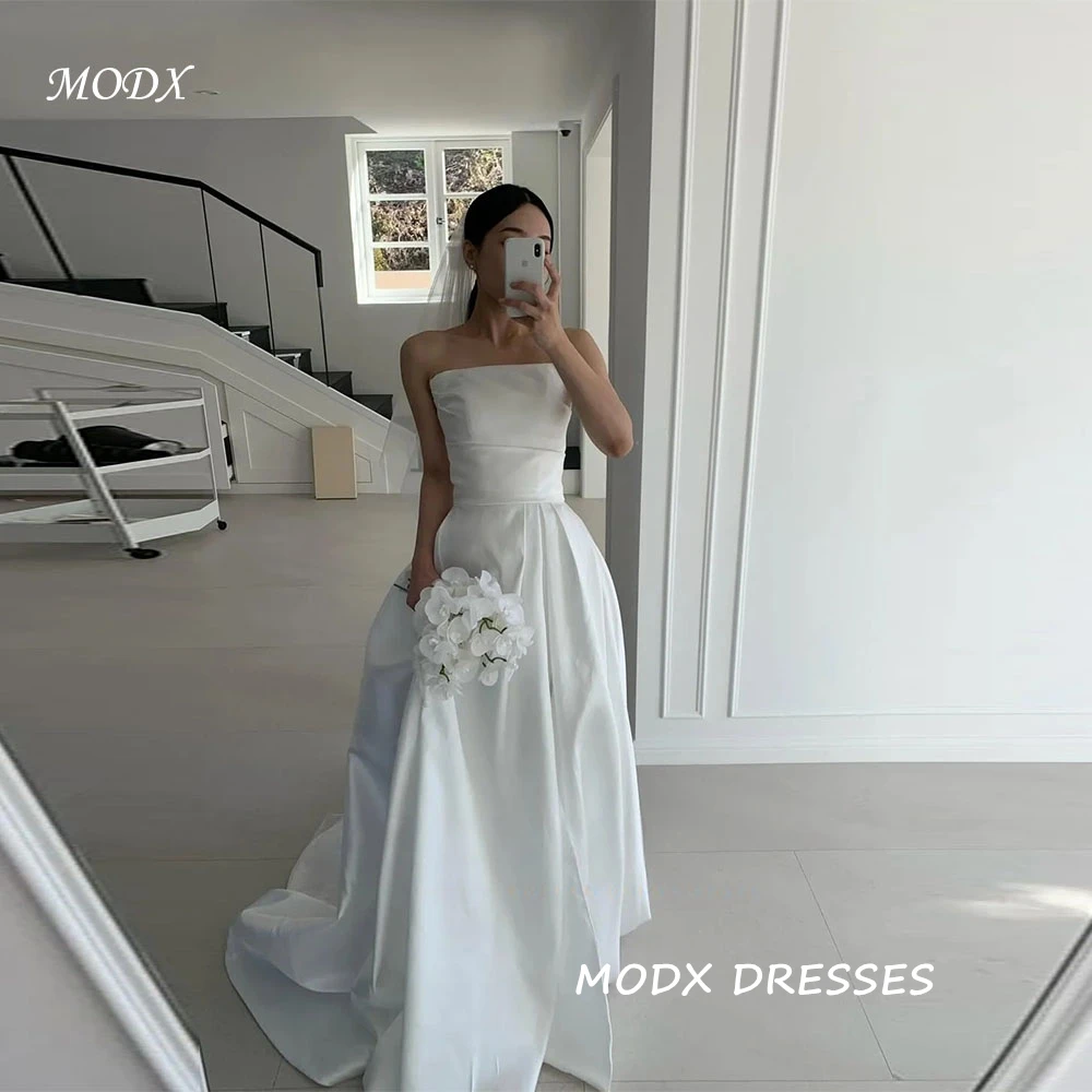 

MODX Customized Simple Korean Photo Shoot Wedding Dresses Anniversary Gown Pregnant Bridal Strapless Self-Wedding Gown 2026