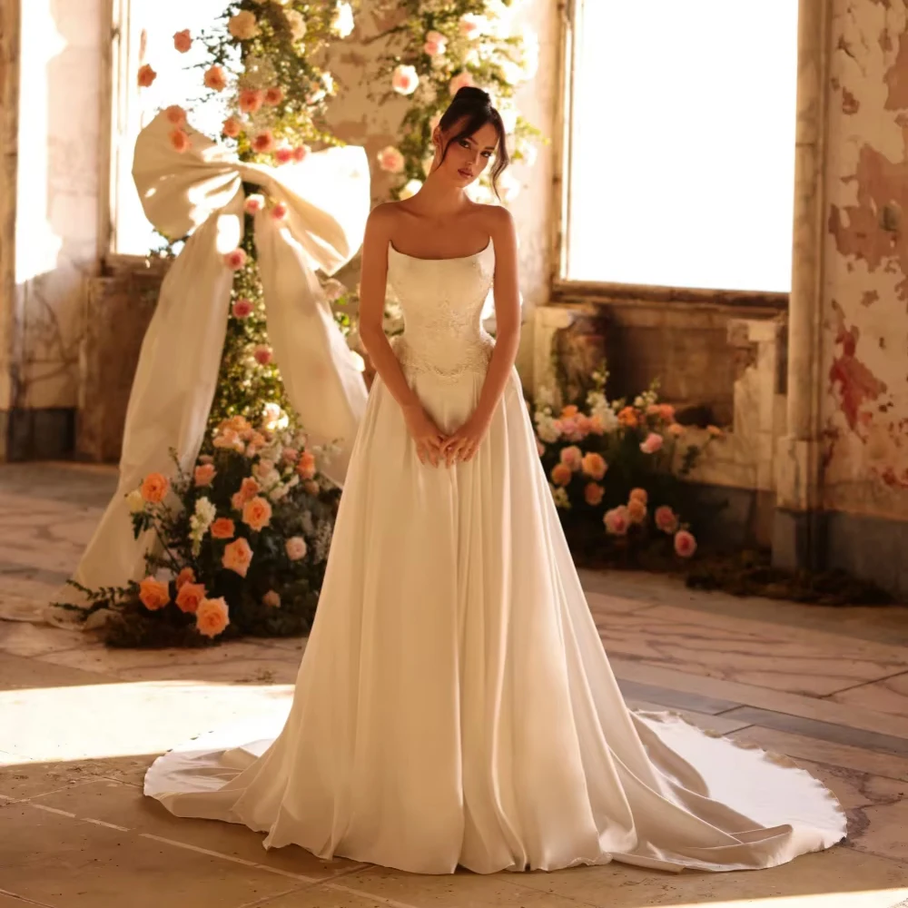 فستان زفاف مخصص من الساتان واللؤلؤ على شكل حرف a للمرأة العروس مشد منظم بدون حمالات أنيق بدون ظهر فستان زفاف #1