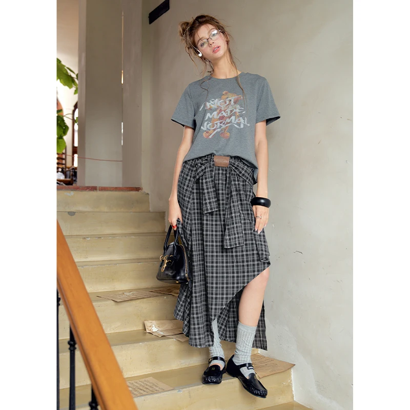 ELFSACK Women's Graphic T-Shirt with Plaid Midi Skirt, Casual 2 Piece Outfit for Everyday, Cozy Asymmetrical Hem Set