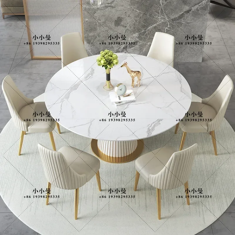 A modern minimalist dining table for a small household space, with a light luxury sintered stone slab round t table