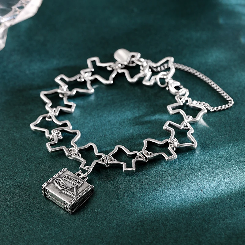 

Genuine 925 sterling silver Texas Charm Bracelet paired with World Traveler Pendant