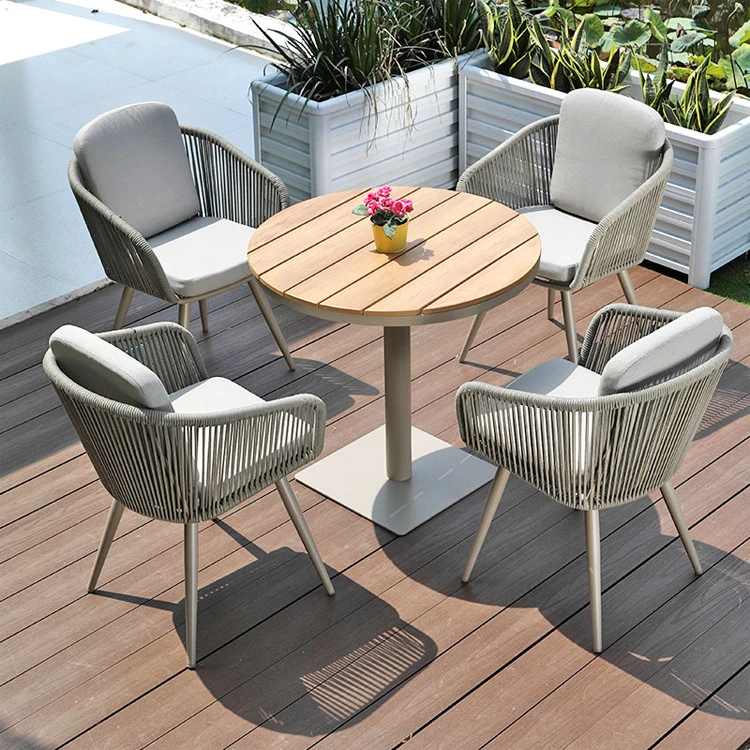 

Foshan Wicker Rattan Plastic Rope Garden Dining Table And 4 Chairs Set Patio Outdoor Furniture Factory Wholesale