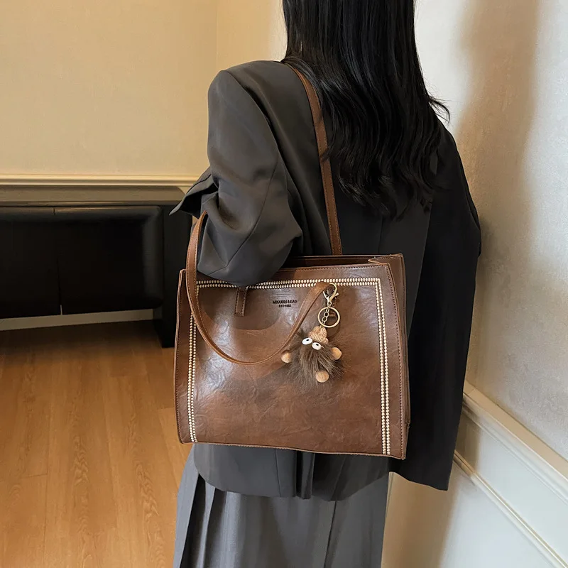 

2025 New Solid Color Simple Shoulder Armpit Bag Casual Commuter Portable Tote Bag