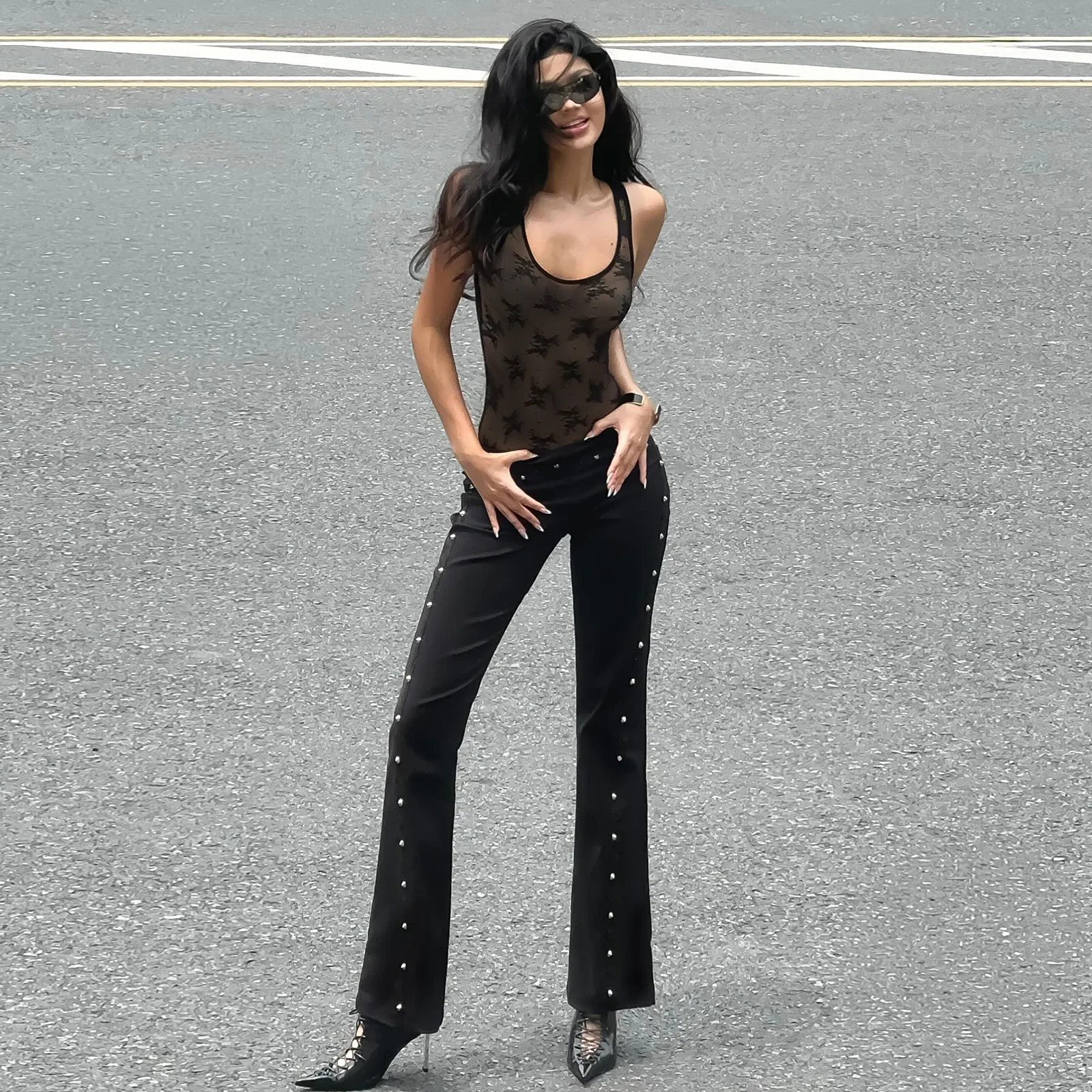 Pantalones informales bajos con decoración de remaches para mujer europea y americana, nueva moda de otoño, personalidad, diseño de calle americana