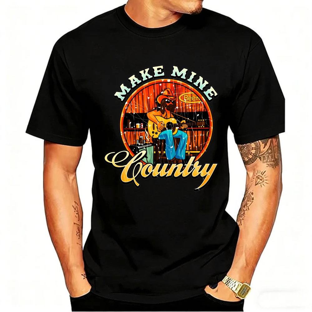 Western Make Mine Country 1976 Designed Vibrant Cartoon Cowboy Strumming A Guitar Against A Beer Barrel Backdrop Short-sleev
