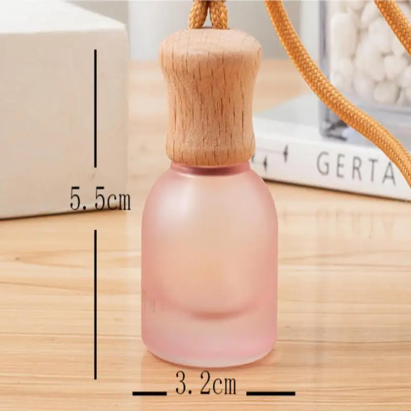 New 1Pcs Refillable Car Essential Oil Diffuser Bottle 11ml Empty Car Air Freshener Pendant Perfume Glass Bottle With Wooden Caps